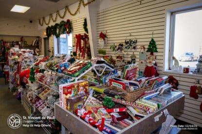 Cheap Christmas gift wrapping paper and tree decorations at SVDP Ozaukee County in Port Washington, WI.