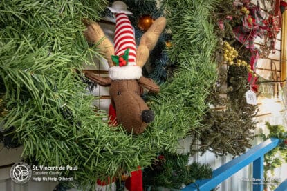 Christmas Wreath with reindeer plush at SVDP Ozaukee County in Port Washington, WI.