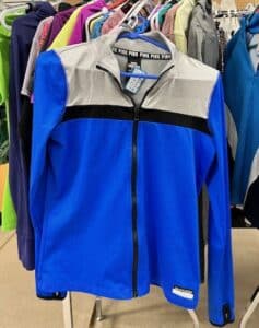 Active wear jacket (royal blue with gray shoulders).