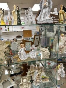 Knickknacks in glass display.