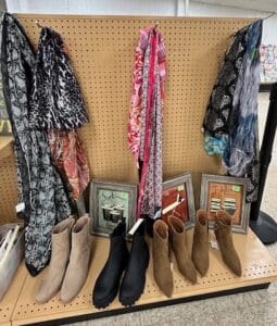 Women's shoes, scarves and picture frames in the Mother's Day display.