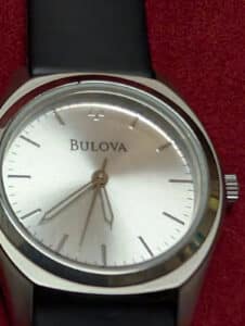 Bulova C860746 Womens Quartz Watch Silver Dial Black Band for parts/not working.