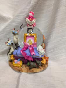 Disney Alice In Wonderland snow globe music box Cheshire Cat.
