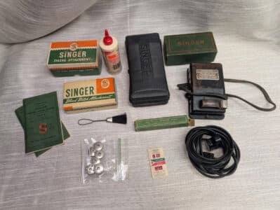 Vintage/Antique Singer sewing machine attachment lot.
