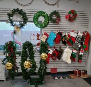 SVDP Christmas Shoppe wreathes and stockings.